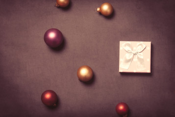 Christmas gift box and baubles