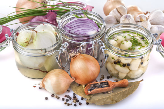 Domestic onion, garlic and red onion preserved in jars