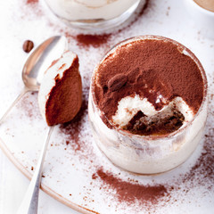 Tiramisu dessert in a glass. Traditional Italian.