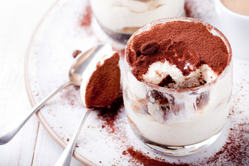 Tiramisu dessert in a glass. Traditional Italian.