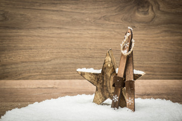 Wooden Christmas Star in Snow with Ski