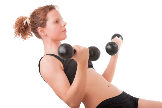 Young woman workout with dumbbells