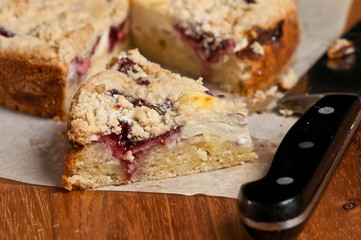 Raspberry Cream Coffee Cake on cutting board and knife