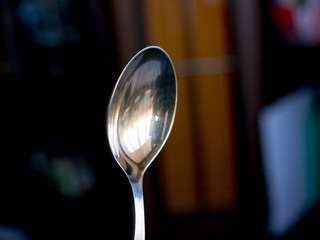 The metal spoon.