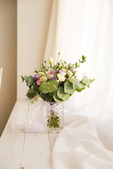 Beautiful  flowers on windowsill background