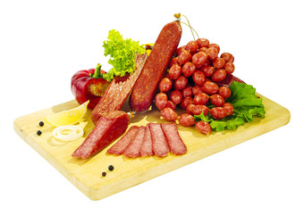 Still life - sausage on the board isolated