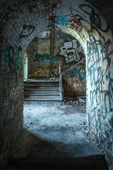 Old abandoned building with graffiti on the walls