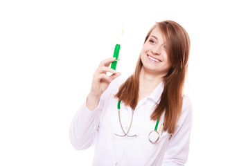 Medical. Woman doctor in lab coat with syringe