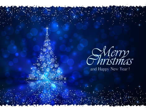 Blue winter background with Christmas tree