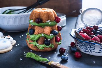 Christmas tree made from cake, fruits and frosting