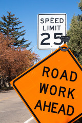 Road work ahead sign and speed limit of 25