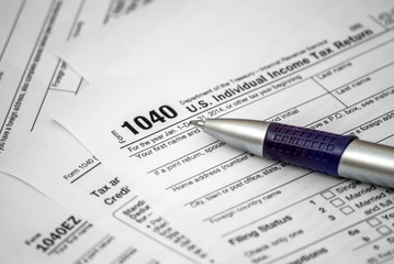 Tax form with pen