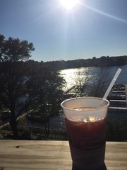 relaxing drink at sunset by the lake