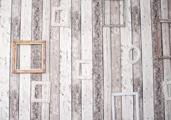 decor of wooden picture frames on the grunge wall