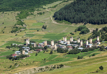 Fototapeta na wymiar Small townlet seen from road to villages community called Ushguli in Upper Svanetia region, Georgia