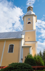 The church tower with a clock in Bystrzyca Klodzka in Poland.