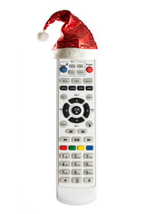 Single remote control with christmas hat isolated on white backg