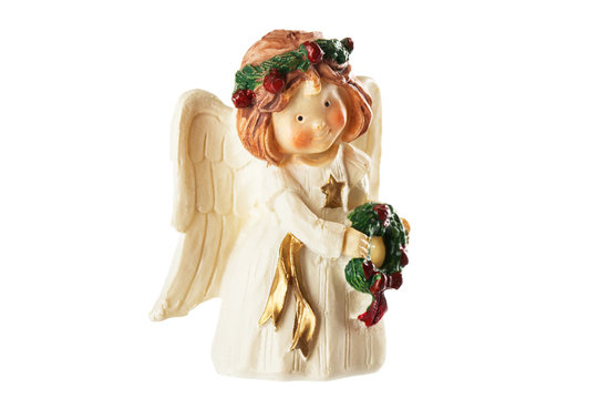Figure of a little angel with wreath in hands, christmas decorat