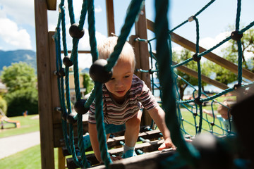 Obraz premium The boy on the playground.
