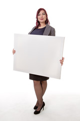 Smiling woman holding blank card