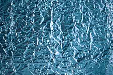 Crumpled foil texture background