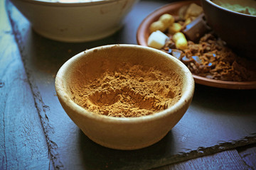 Preparing dough for chocolate pie on table close up