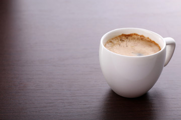 Cup of coffee on table close up