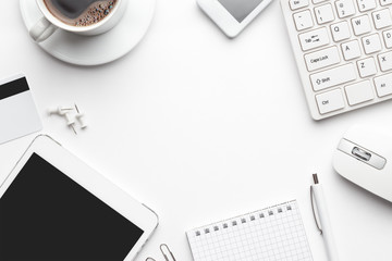overhead of white office table with copy space