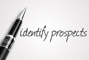 pen writes identify prospects on white blank paper - 95426820
