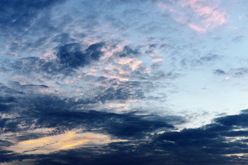 Naklejka na ściany i meble Sunset cloudy sky background