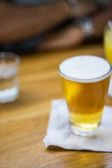 Glass of draft beer in cafe