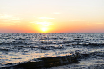 Fototapeta na wymiar Sunset on the summer beach