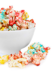 Sweet colourful popcorn isolated on white background