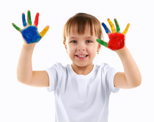 Little girl with hands in paint, isolated on white
