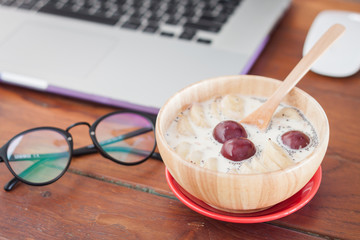 Granola with fruits on work station