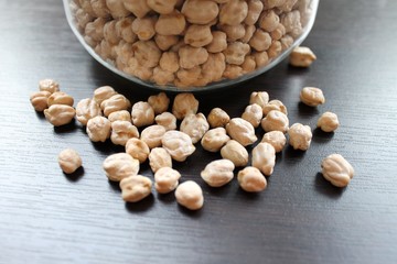 Dried Chickpeas in a glass jar on the table for cooking