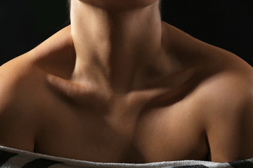 View on woman's neck, collarbone and shoulders, close-up