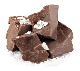 Black chocolate pieces with salt isolated on white