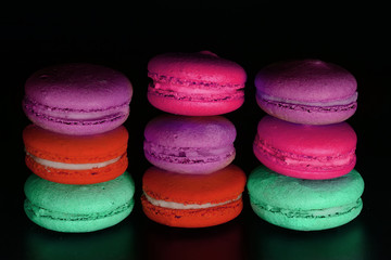 Macarons isolated on black