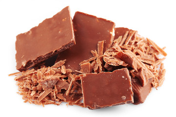 Milk chocolate pieces isolated on white