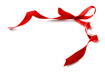 Shiny red bow isolated on white
