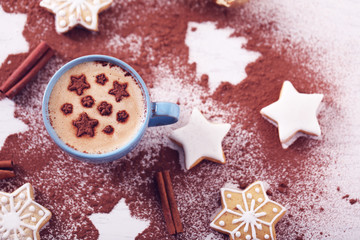 Beautiful composition with cup of cappuccino and Christmas cookies