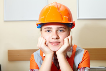 Young contractor relaxing in the office