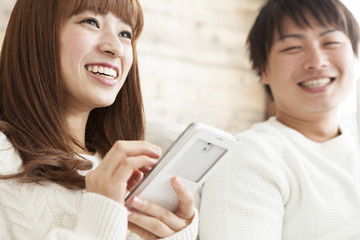 Young couple are relaxing at home