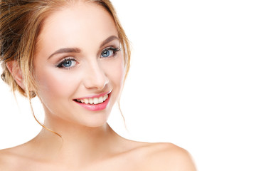 Fototapeta premium Studio shot of a beautiful young woman with perfect skin against a gray background