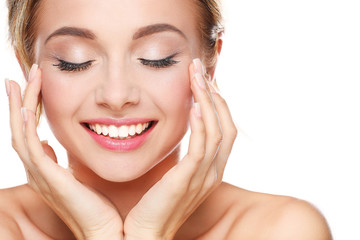 Fototapeta premium Studio shot of a beautiful young woman with perfect skin against a white background