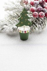 Christmas decoration over silver background.