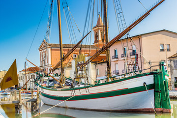 ancient sailboats on Italian Canal Port