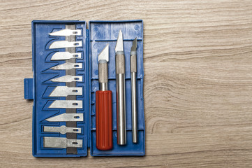 Set of carving knives and blades, in the blue box.