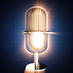 Retro microphone on blue background